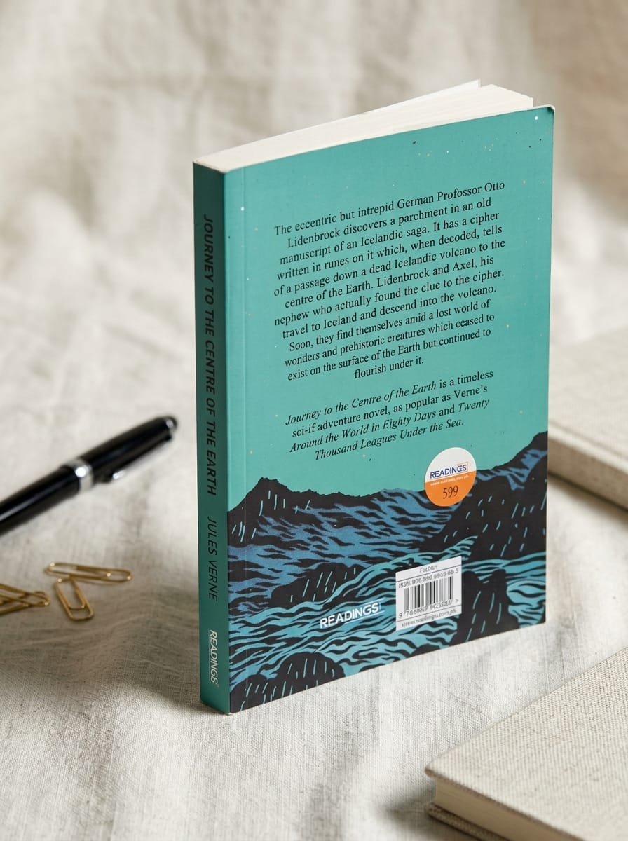 Book with a blue cover featuring text and a mountain illustration on a light background