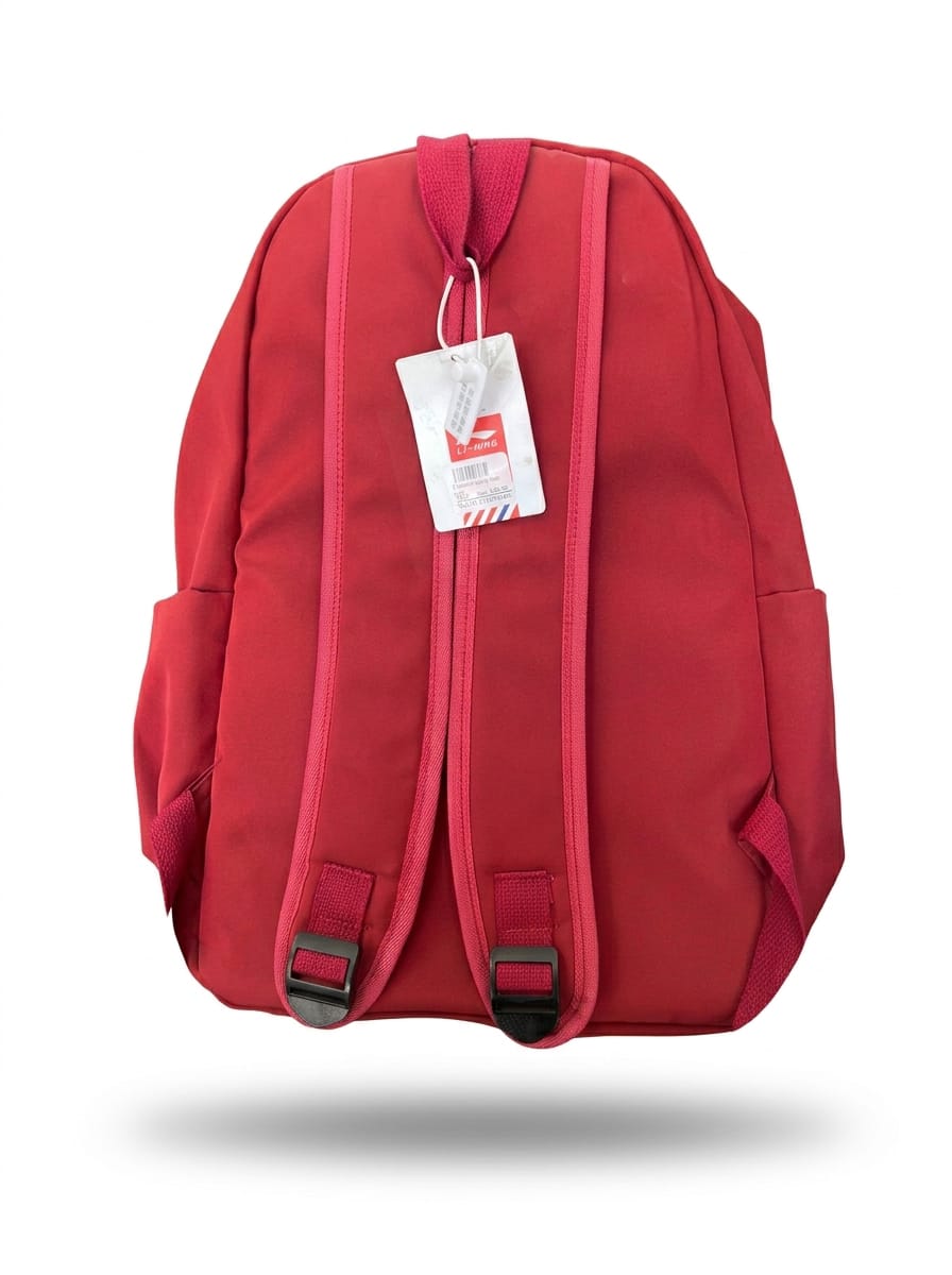 "Back view of Li-Ning red backpack showing padded adjustable shoulder straps with black buckles, reinforced back panel, top carry handle, and white product tag with Li-Ning branding"
