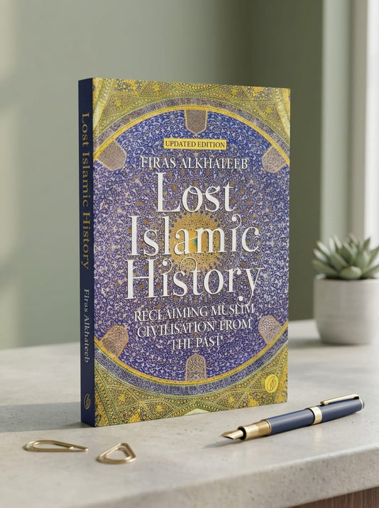 Book titled 'Lost Islamic History' on a table with a pen and plant in the background