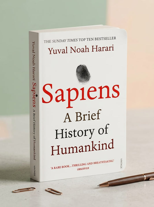 Book titled 'Sapiens: A Brief History of Humankind' by Yuval Noah Harari on a light background.