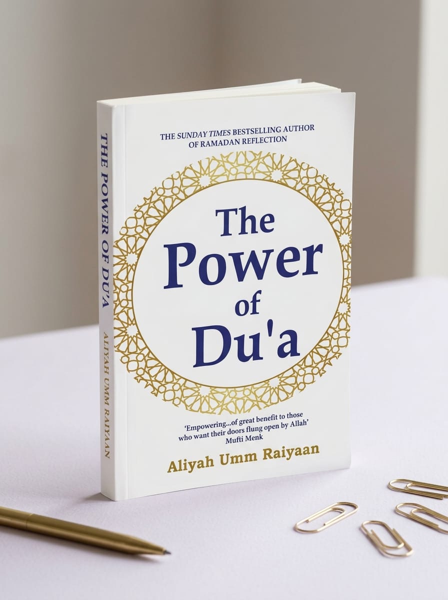 Book titled 'The Power of Du'a' by Aliyah Umm Raiyaan on a light surface with decorative elements.